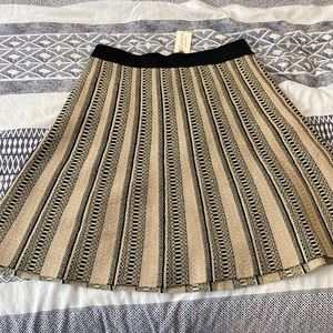 Gold and black size L elastic waist skirt, never worn.